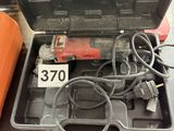 an open tool box with tools in it sitting on top of a table