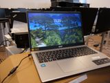 a laptop that is sitting on a table in a room