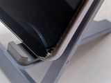 a close up of a cell phone on a stand