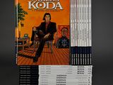 a stack of books with a picture of a man sitting on a chair