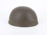 an old helmet on a white surface with a white background