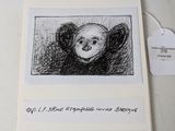 a drawing of a bear in a box on a table