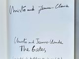 an open book with a handwritten title on it