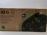 an aeg air purifier in a box on a table