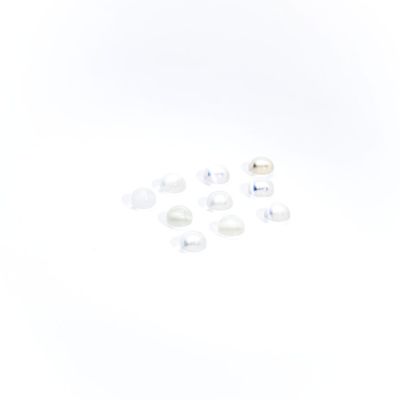 a lot of different types of ear plugs on a white surface