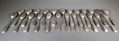 a lot of spoons that are sitting on a table