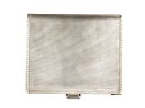an image of a silver purse sitting on top of a white surface
