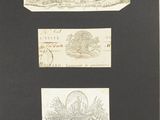 a black and white photo of three different types of stamps