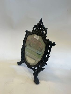an image of a mirror sitting on top of a white table