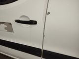 a white van with black trims and a black door handle