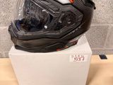 a helmet and goggles sitting on top of a box