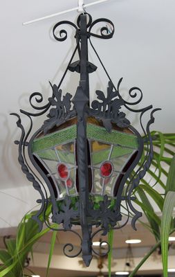a lamp hanging from the ceiling in a room