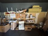 a room filled with boxes and a sign that says candy