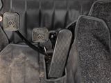 an image of a close up of a car ' s pedals