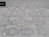 a lot of empty wine glasses sitting on a table