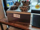 a counter with a bunch of utensils on it