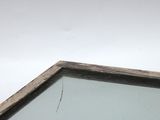 a bird that is sitting on top of a window sill