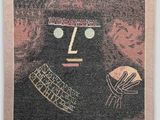 an image of a tapestry with a picture of a face on it