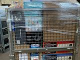 a cart with a lot of boxes on it in a warehouse