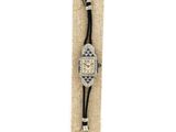 an image of a wrist watch with a black leather strap