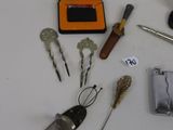 a lot of tools that are laying out on the table