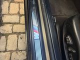 a bmw emblem on the side of a car door