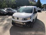 a picture of a white van parked in a parking lot