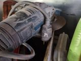 an image of a close up of a drill on a table