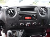 a dashboard of a car with various controls on it