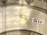silver plate with a label on it that says 844