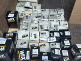 several boxes of various types of electronic devices are stacked on top of each other