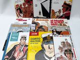 a lot of books that are on a table