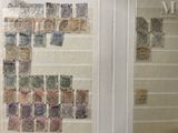 a picture of a wall with stamps on it