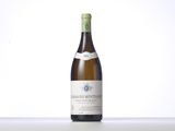 the bottle of wine is sitting on the table with a white background
