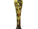 a vase that is sitting on a white surface