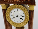 a clock that is sitting on top of a table