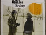 french movie poster for les granges brulees, starring delon signoret