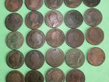 an image of a pile of old coins on a green surface