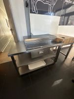 Desserte inox à deux plateaux et un tiroir