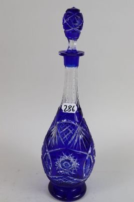 an image of a blue glass bottle with a star of david on it