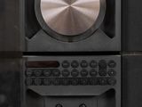 a stereo system with speakers and a radio on a table