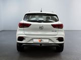 the rear end of a white suv parked in a room