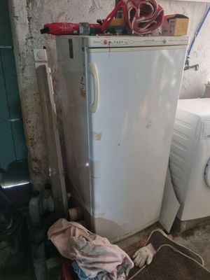 an image of a kitchen with a washing machine and dryer