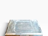 an image of a metal tray with a metal lid on a white surface