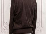 an image of a mannequin mannequin wearing a brown sweater