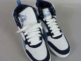 a pair of blue and white shoes on a white surface