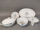 an image of a group of porcelain dishes and bowls on a table