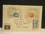 une vieille carte postale sur laquelle figurent deux timbres et un cachet postal