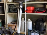 a yellow tool box with tools in it in a garage