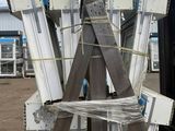 several pieces of wood are stacked on top of each other in a pile